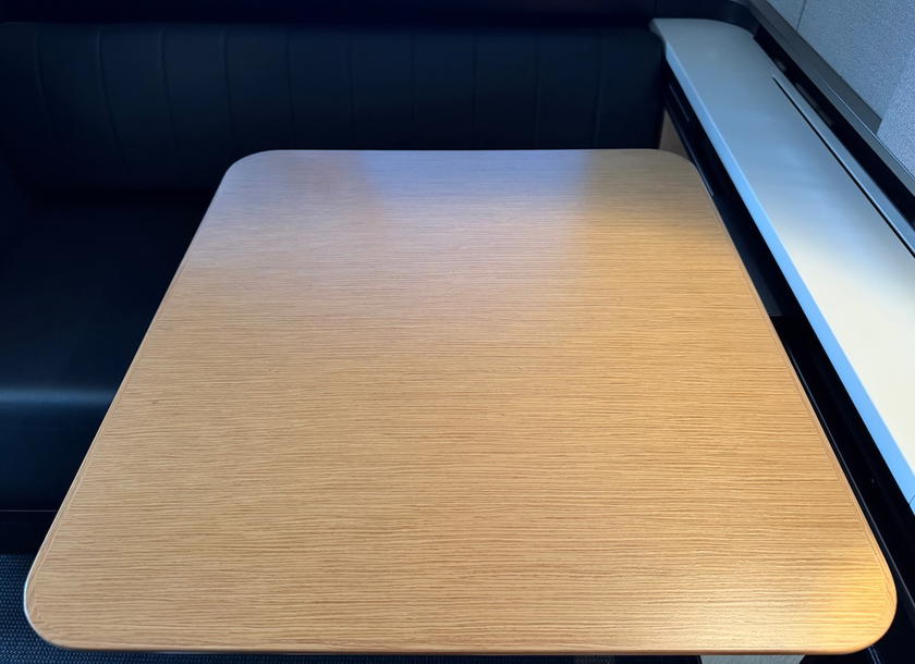 Large fold-out tray table in the SWISS first class double suite