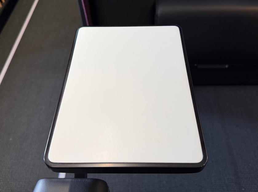 Small aisle-side drink tray in the SWISS first class double suite