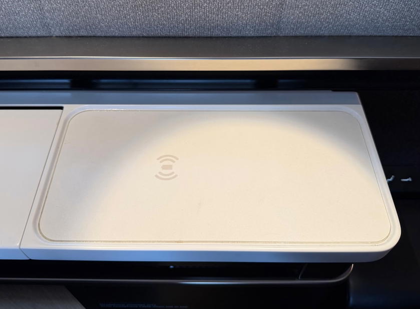 Wireless charging pad and storage area in the SWISS first class double suite