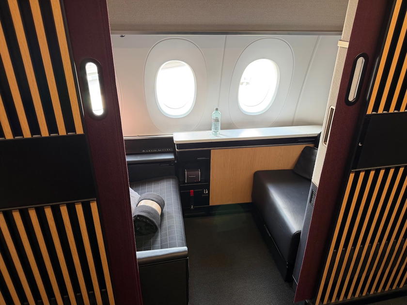 SWISS first class suite 1A with privacy partition and flat-bed seat