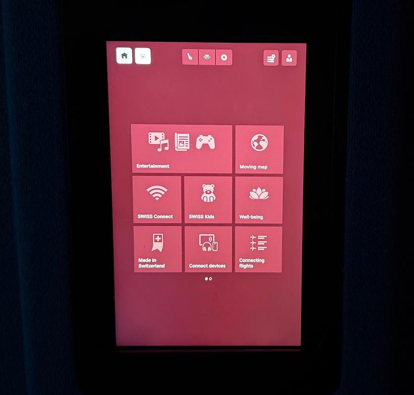 Personal tablet used to browse entertainment options in SWISS first class