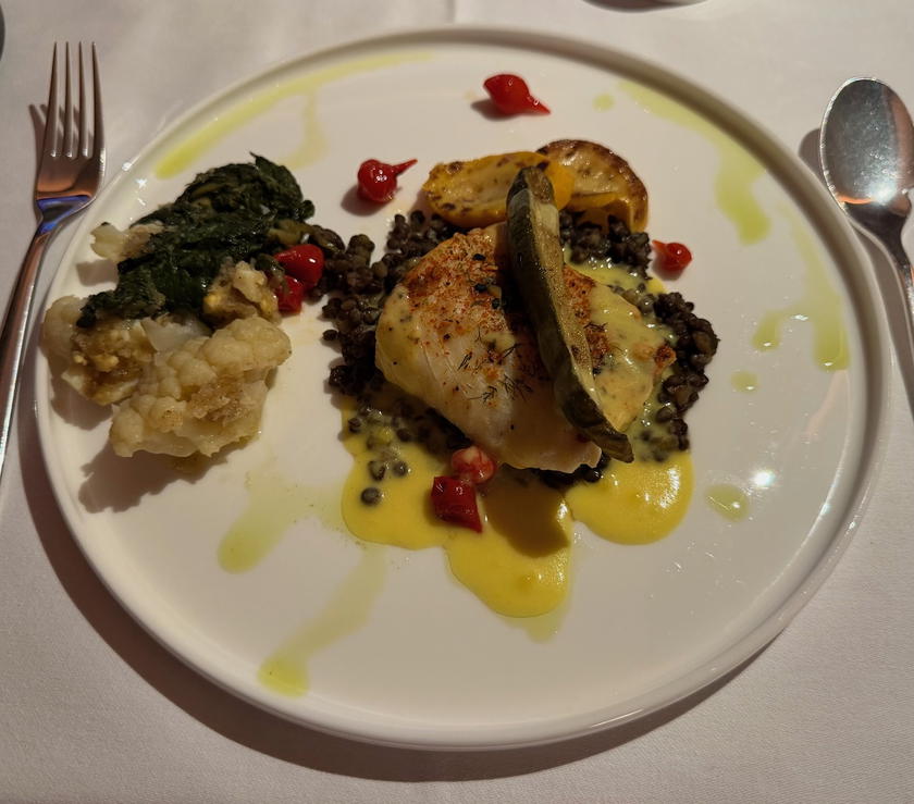 Black cod main course served in SWISS first class