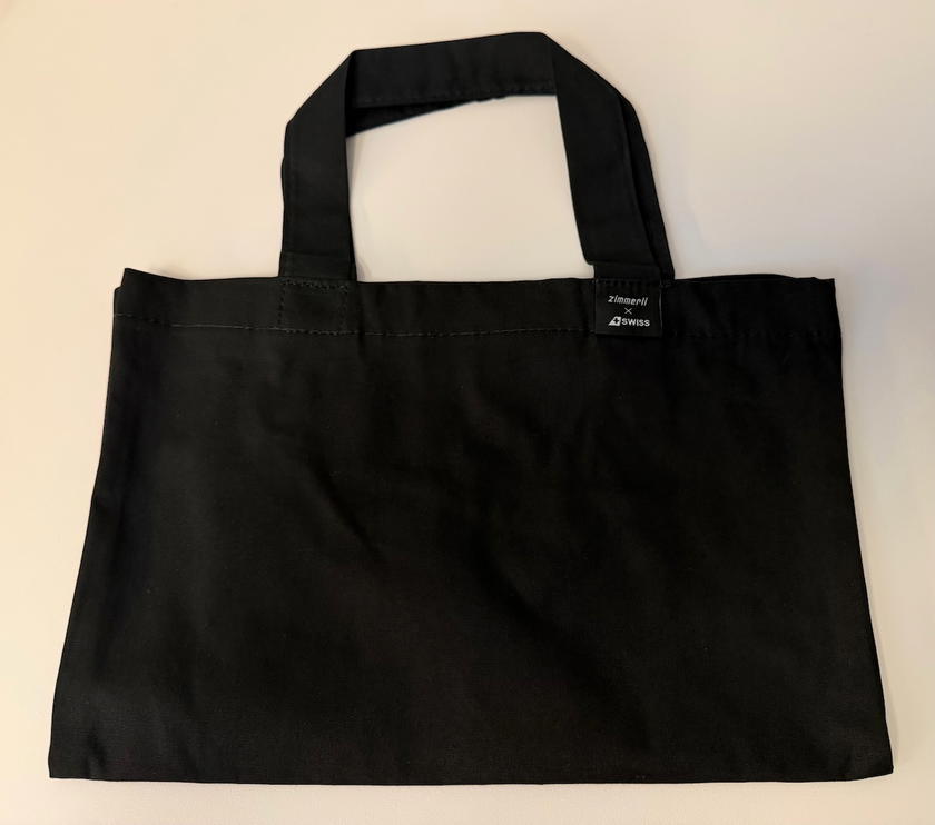 Tote bag provided to carry pajamas to the lavatory in SWISS first class