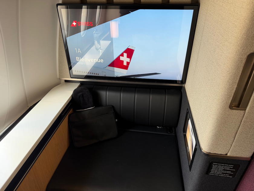 Close-up of the SWISS first class suite 1A seat and entertainment screen