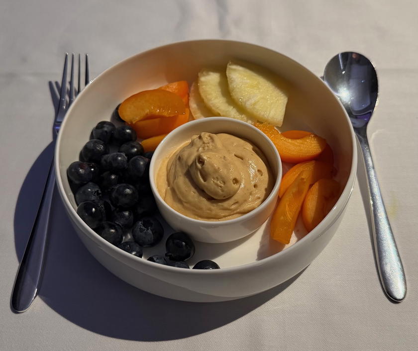 Fresh fruit with caramel cream served as a pre-landing dessert in SWISS first class