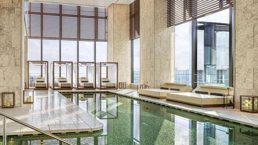 Outdoor pool at the BVLGARI Hotel Tokyo overlooking the city skyline