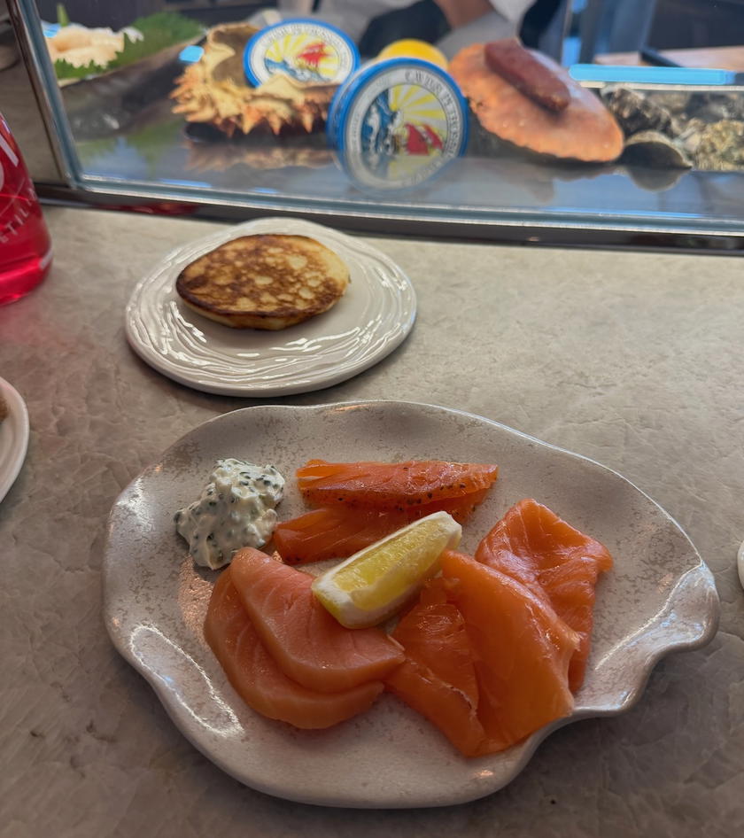 Caviar and seafood served at the L'Encre counter aboard Orient Express Corinthian