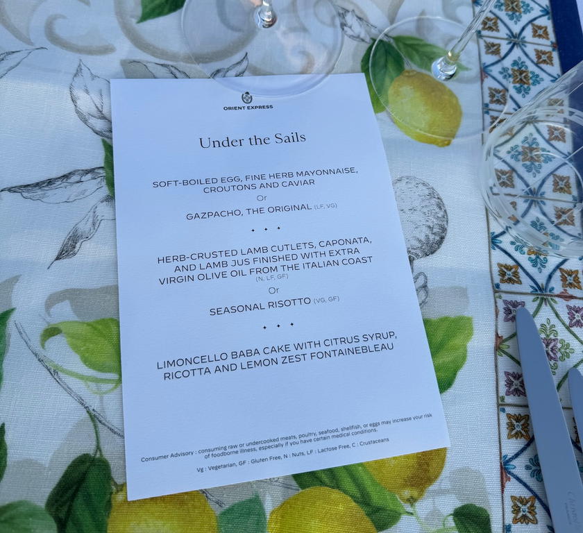 The printed menu for the dinner held beneath the sails aboard Orient Express Corinthian