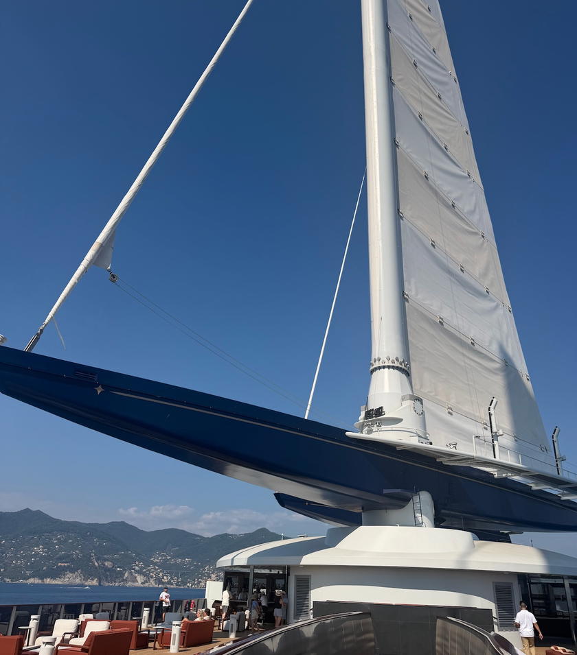 Orient Express Corinthian's sails raised during an evening departure