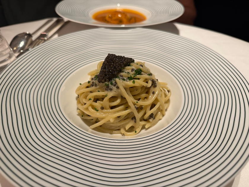 A seafood course served at L'Écrin restaurant aboard Orient Express Corinthian