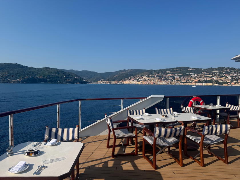 Guests dining at La Terrasse restaurant aboard Orient Express Corinthian