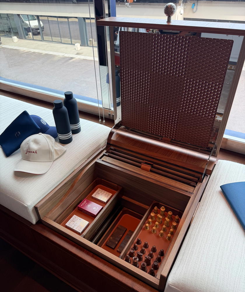 Board games stored beneath the window seat in an Orient Express Corinthian suite