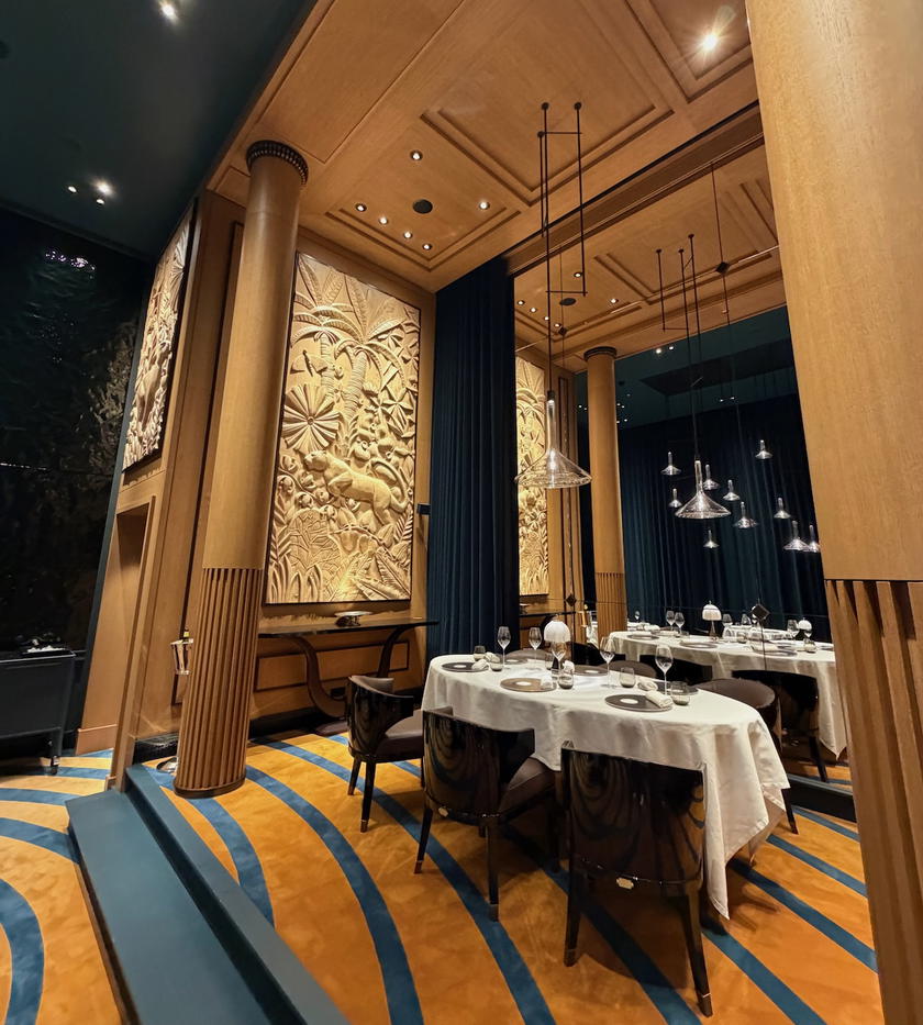 Interior of La Table de l'Orient-Express restaurant with sculpted wall details
