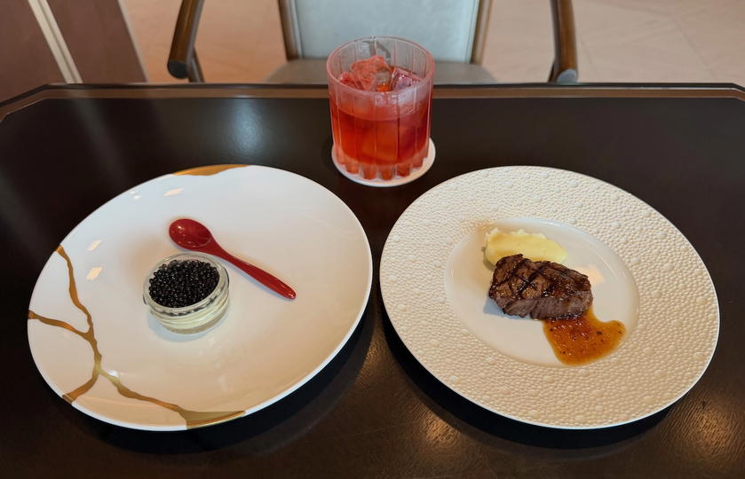 Dining spread with champagne and food at the Osaka Station Hotel Specialty Salon