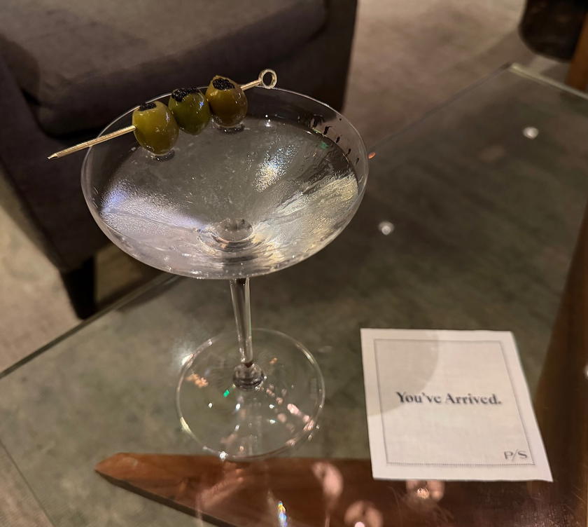 Signature PS Martini garnished with caviar-stuffed olives at PS LAX