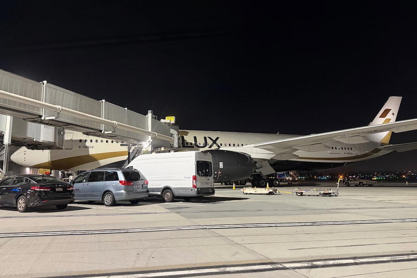Starlux Airlines A350 aircraft parked at a gate at Los Angeles International Airport