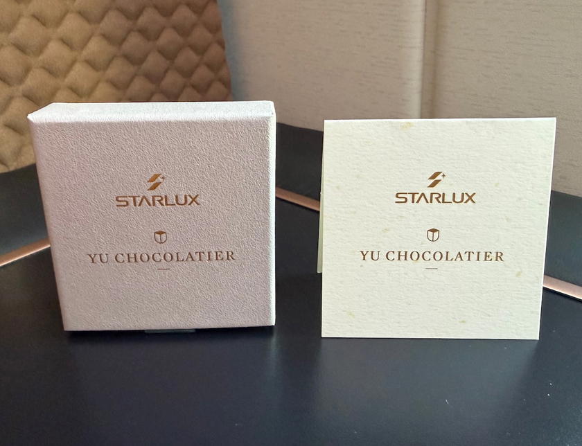 Box of chocolates from Yu Chocolatier and a welcome note in Starlux first class