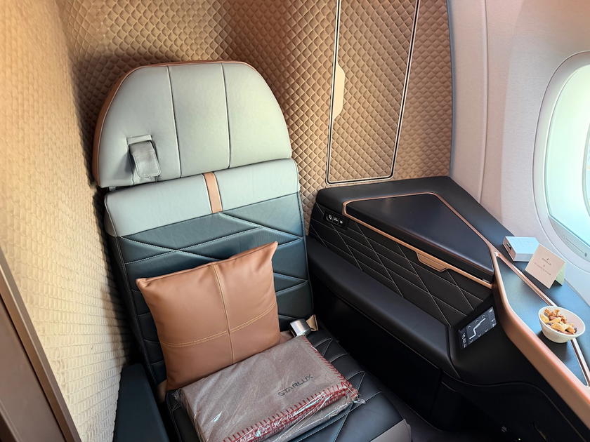 Starlux A350-1000 first class seat in the lie-flat position