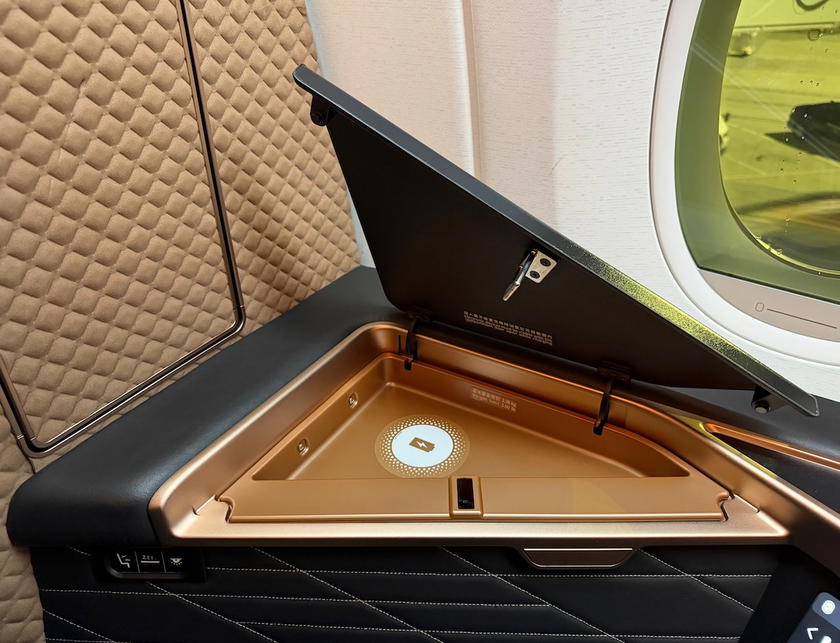 Storage compartment built into the Starlux Airlines first class seat on the A350