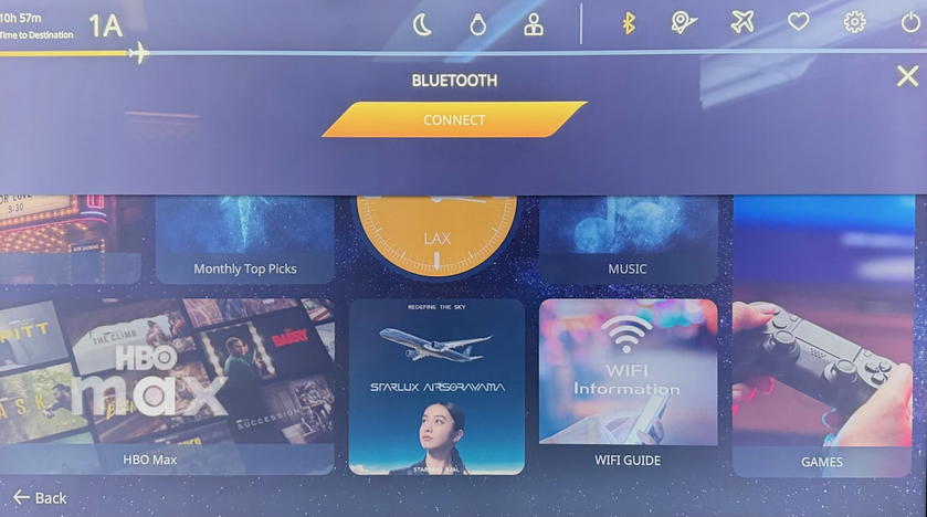 Entertainment screen displaying content in Starlux Airlines first class
