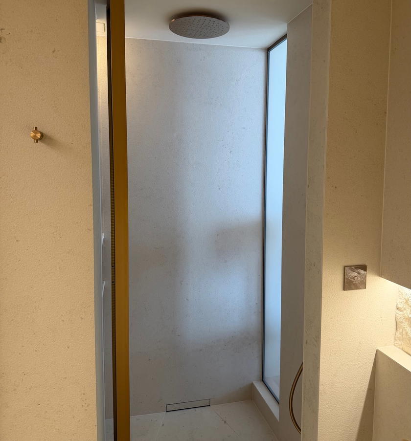Walk-in shower in a guest room bathroom at Villa Dubrovnik