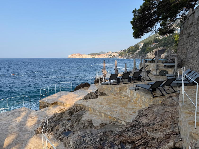 Loungers on the seaside platform overlooking the Adriatic at Villa Dubrovnik
