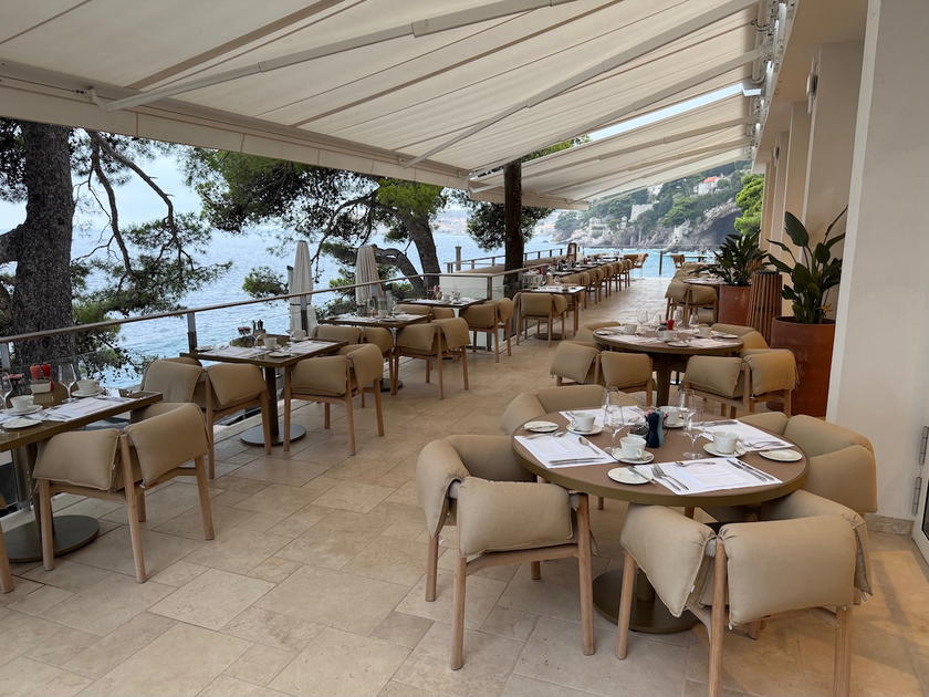 Restaurant Pjerin's terrace seating overlooking the water
