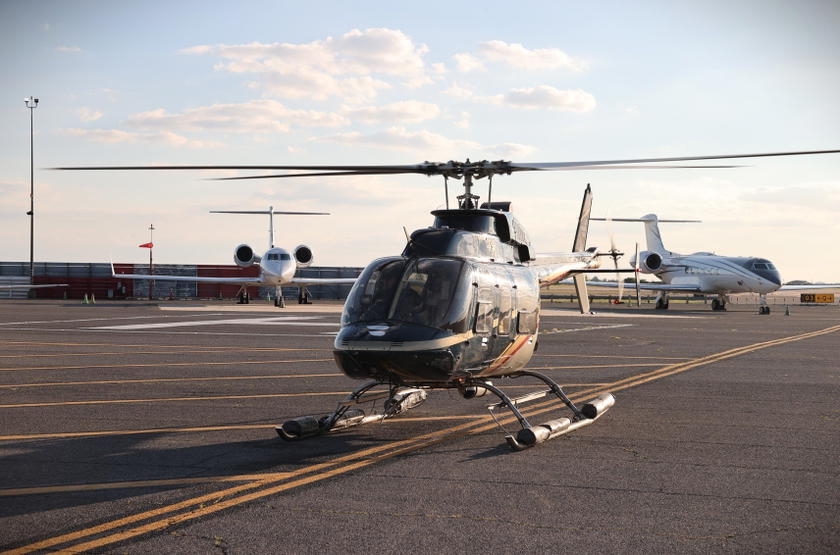 Blade Bell 407 helicopter parked at JFK Airport after arrival