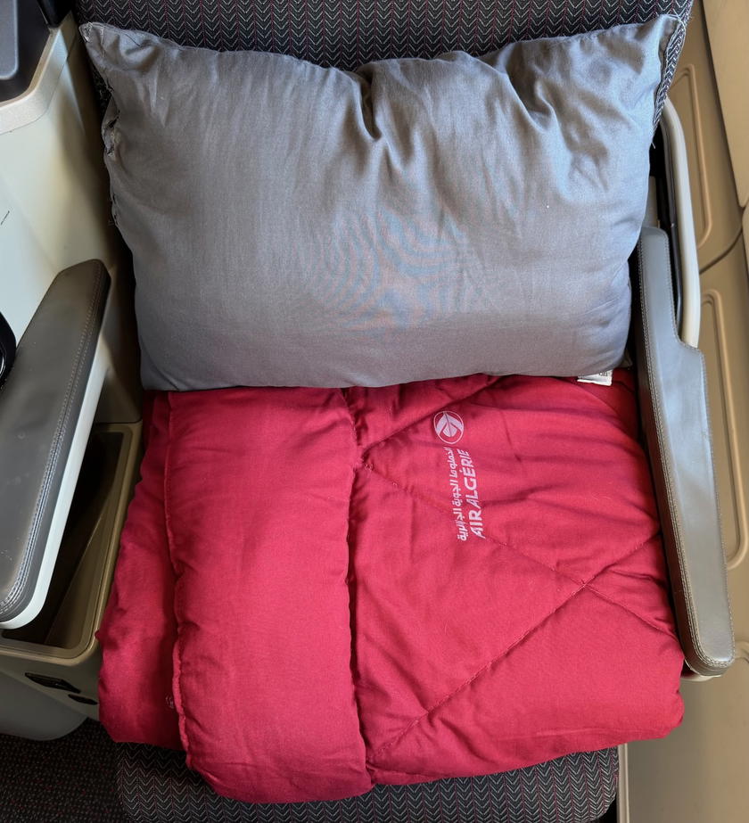 Large pillow and thick blanket provided in Air Algerie business class