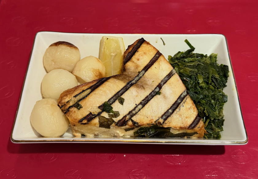 Fish main course served in Air Algerie business class