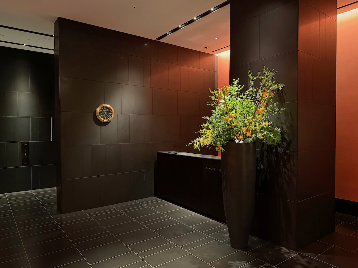 Reception and concierge desk off to the side of the 40th-floor lobby