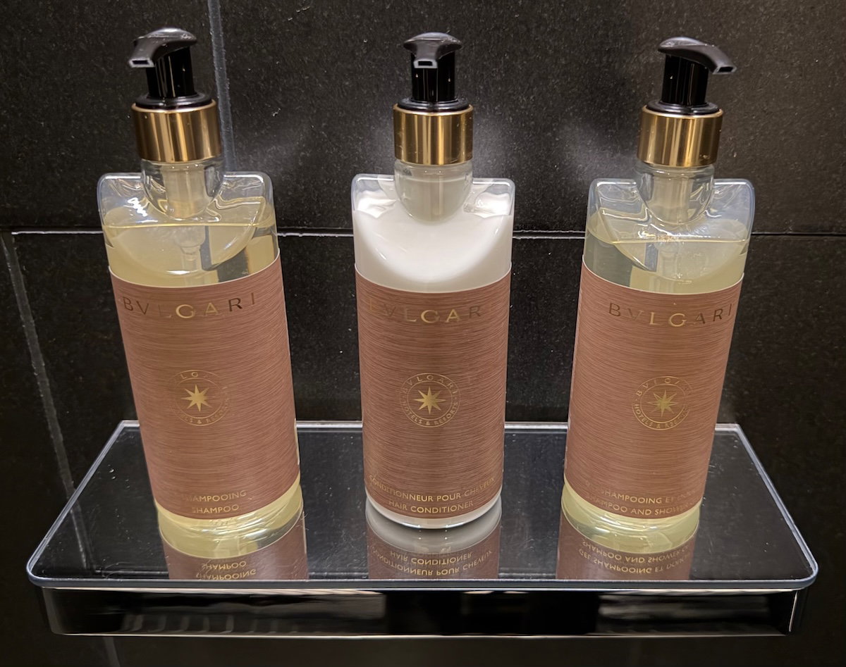 Bulgari-branded toiletry bottles lined up on the bathroom counter in a Bulgari Hotel Tokyo room