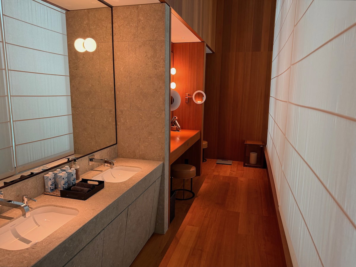 Spa changing area with vanity and seating