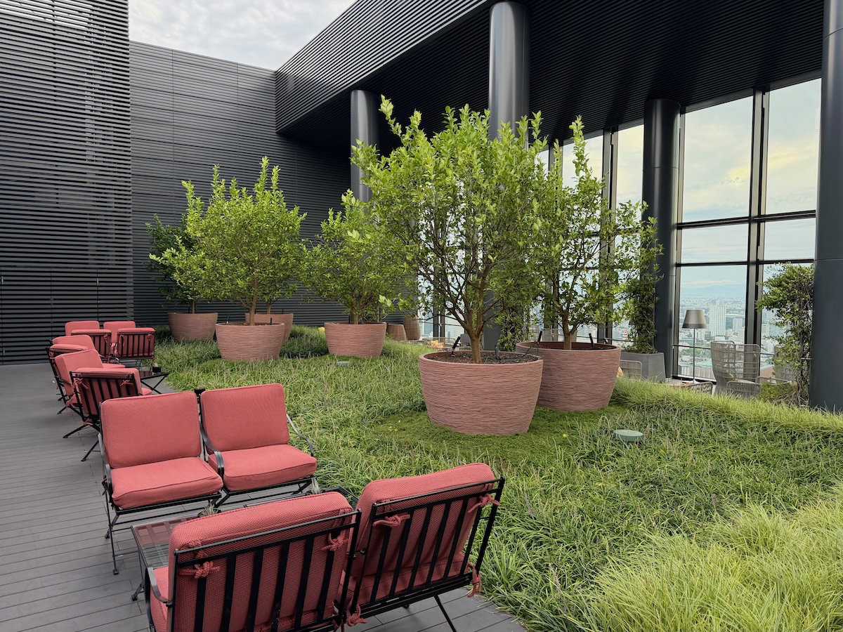 Outdoor terrace seating at the Bulgari Bar high above Tokyo
