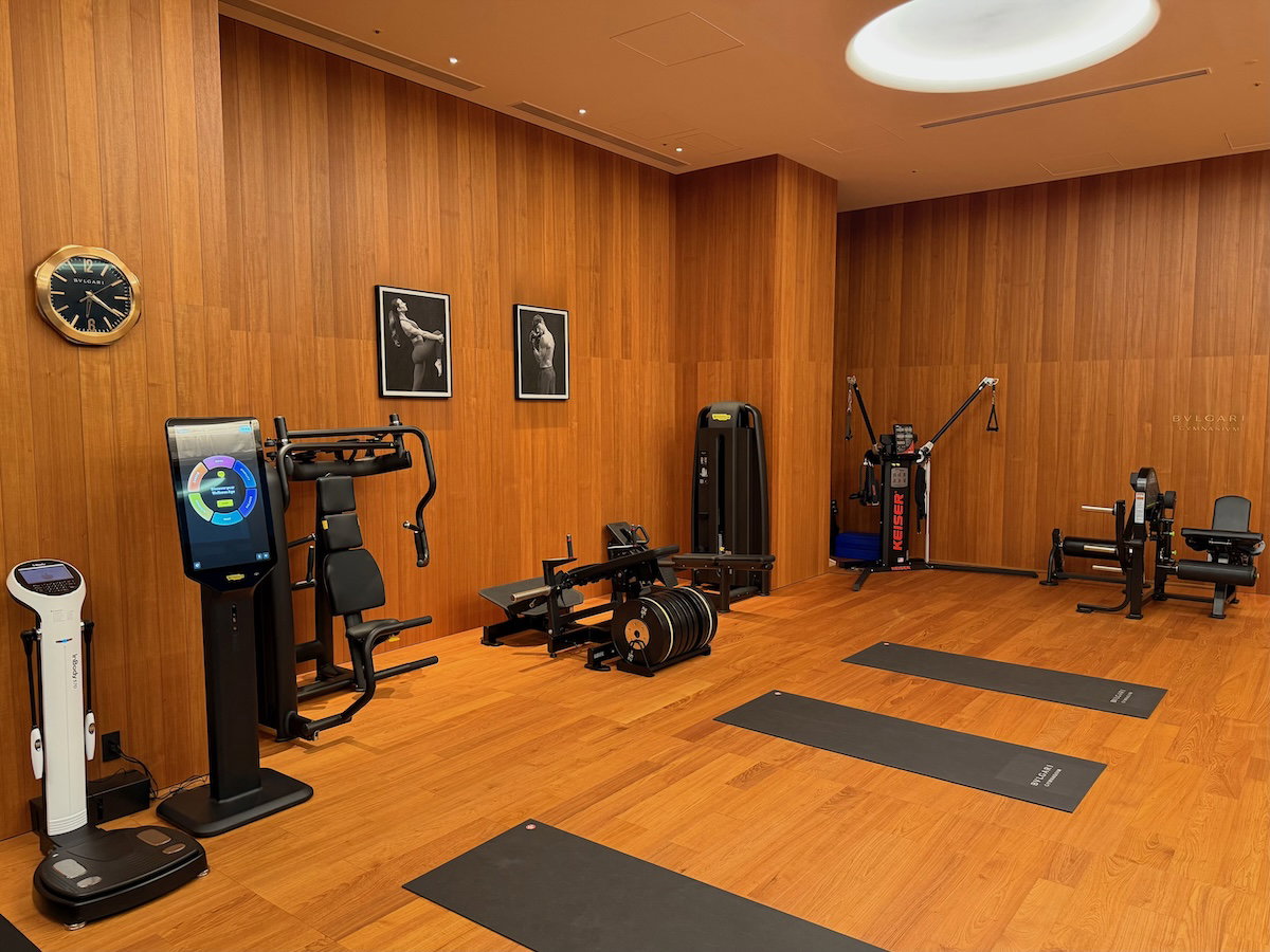 Racks of heavy dumbbells in the 24-hour gym