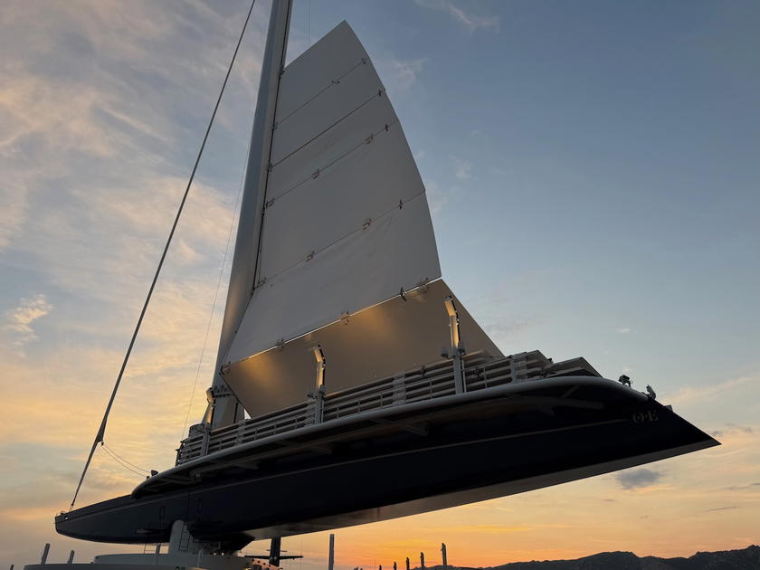 Large sails extended on the Corinthian sailing yacht