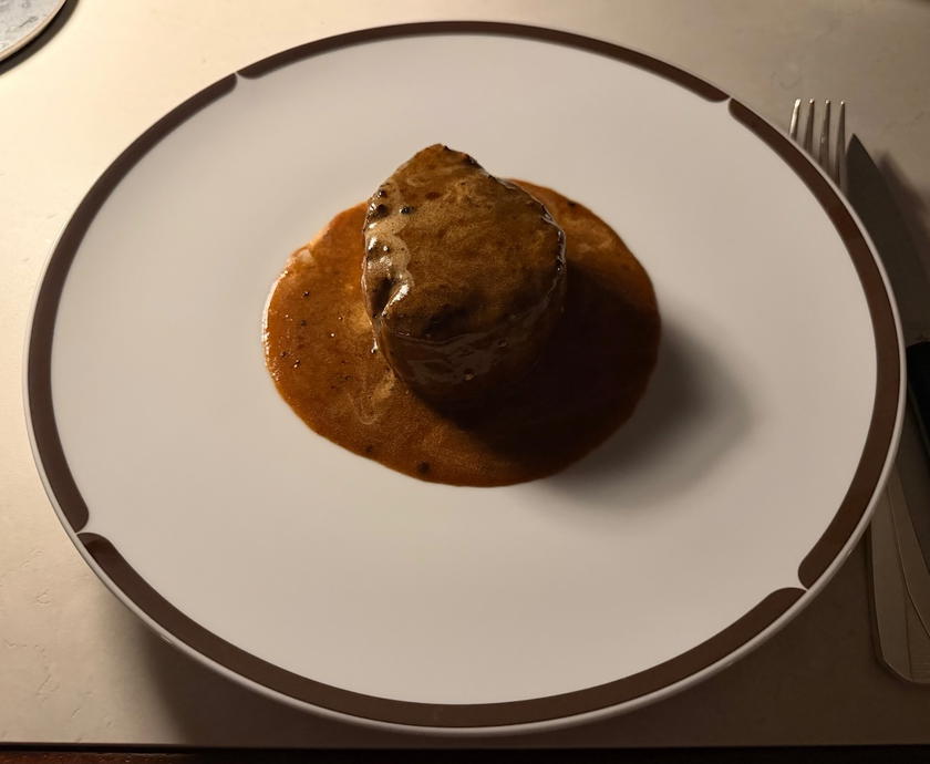 A plated dinner dish served aboard the Orient Express Sailing Yachts Corinthian