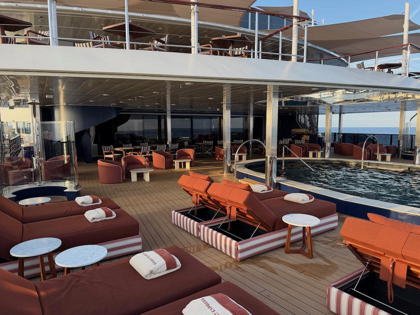 Pool deck area on the Corinthian with loungers