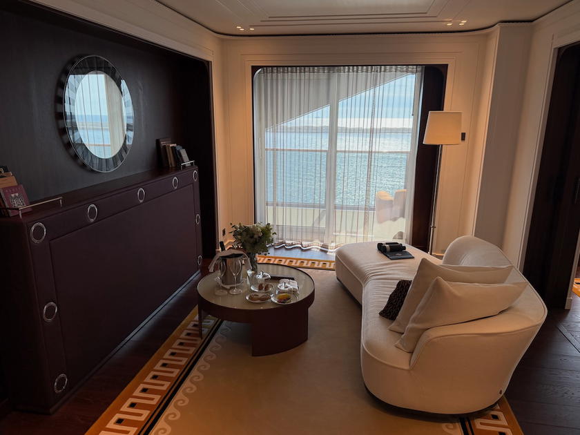 Living room area of a suite aboard the Corinthian