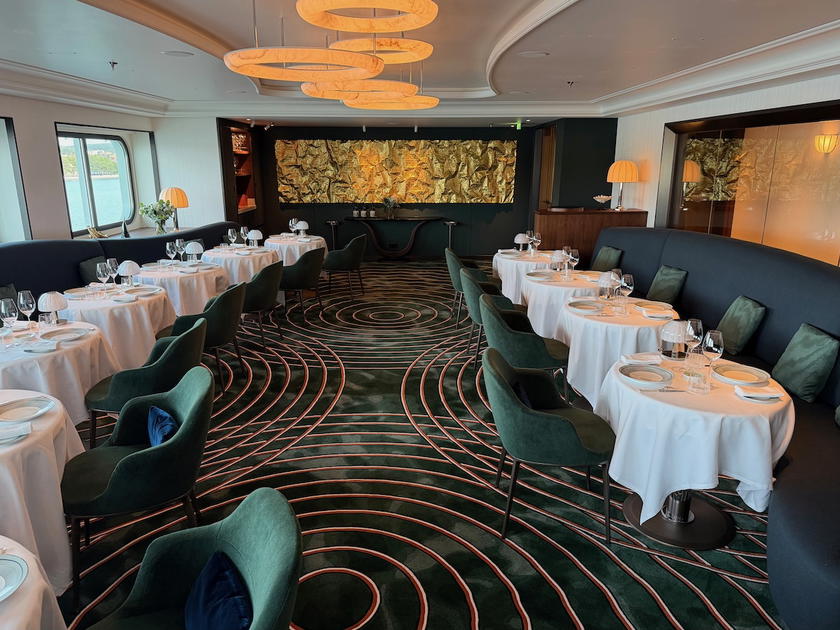 The Italian restaurant interior aboard the Orient Express Sailing Yachts Corinthian