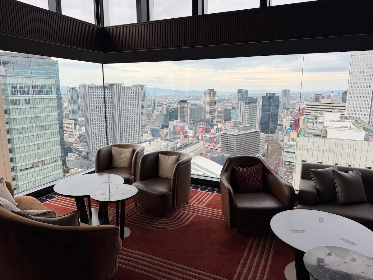 Seating area and train-inspired decor in the Main Bar at Osaka Station Hotel