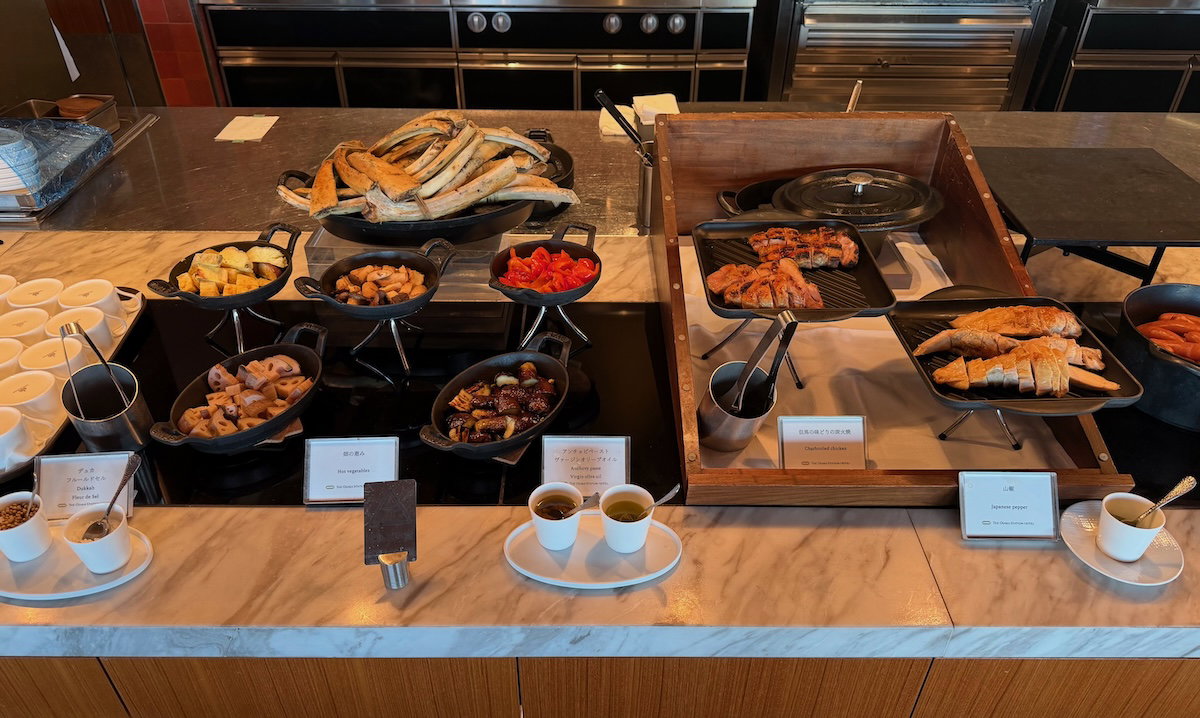 Breakfast buffet station with prepared dishes at Osaka Station Hotel