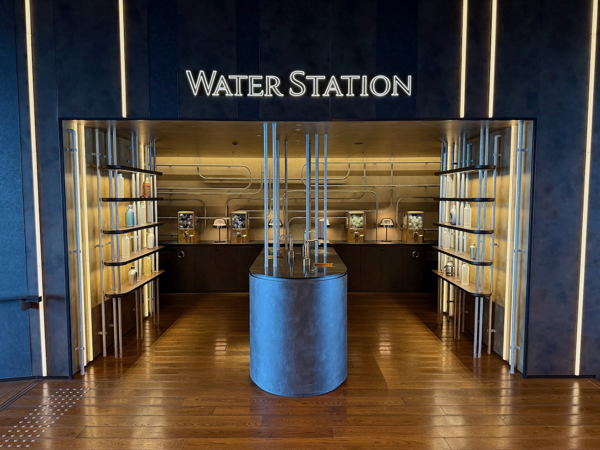 Water refill station with capsule toy machines in the hotel lobby