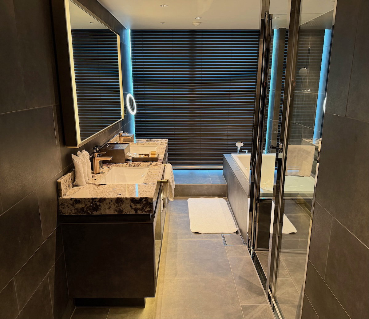 Guest room bathroom spanning the length of the room
