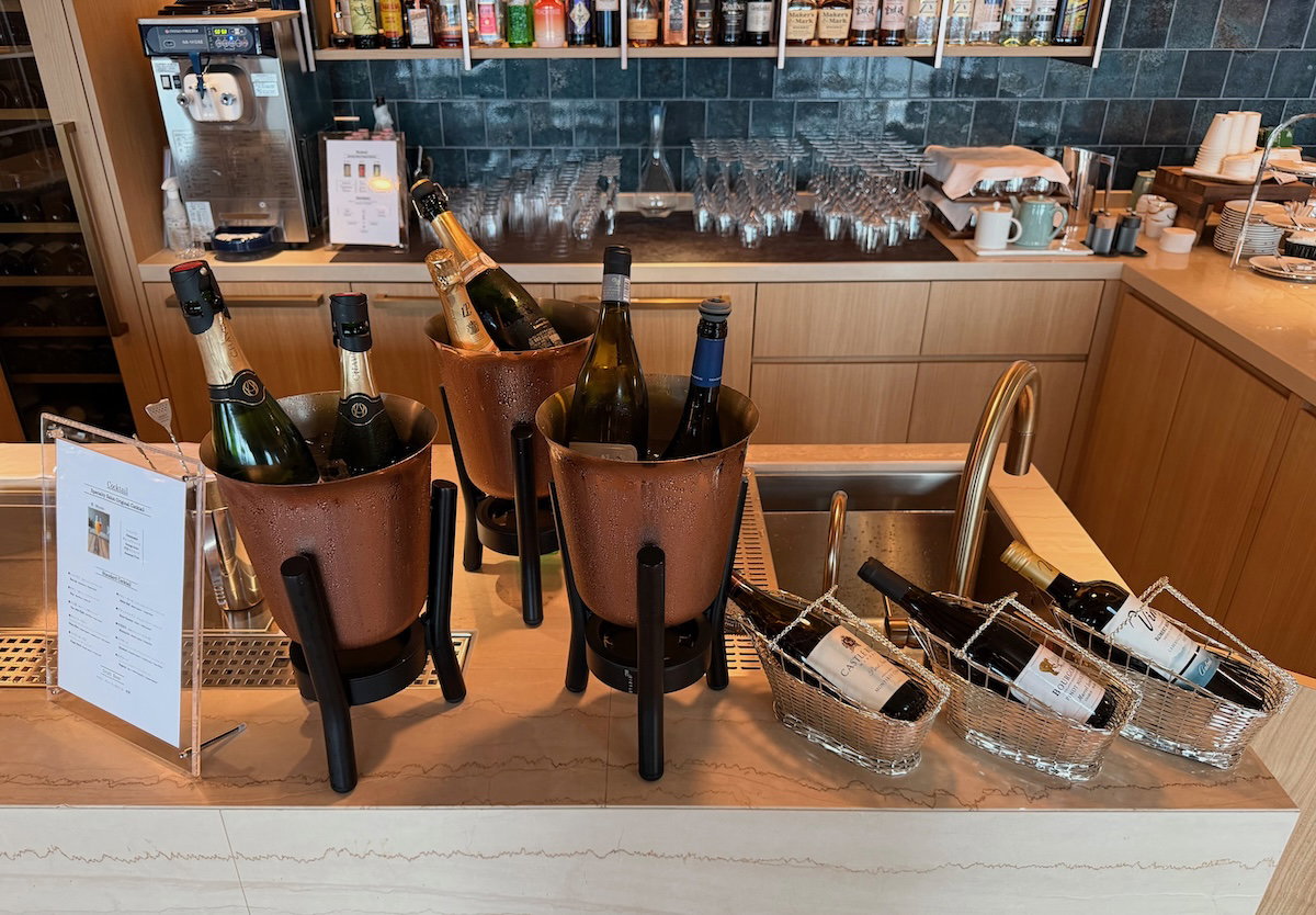 Wine and champagne bottles on display in the Specialty Salon