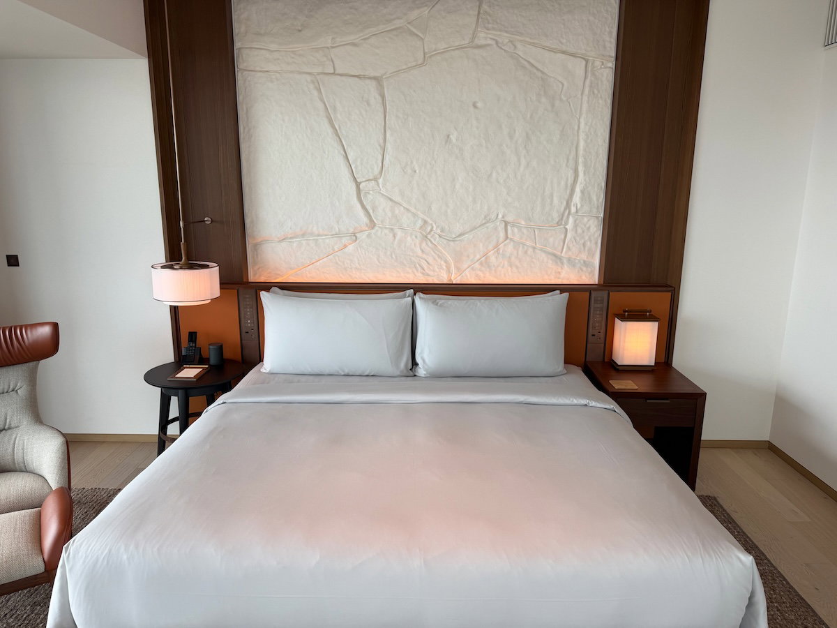 King bed with patterned headboard design at Patina Osaka