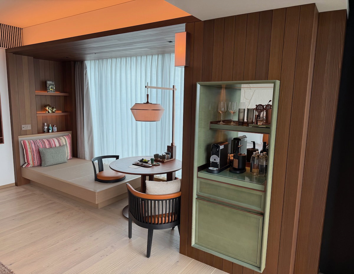 Dining table with a standard chair and a traditional Japanese floor-style seat