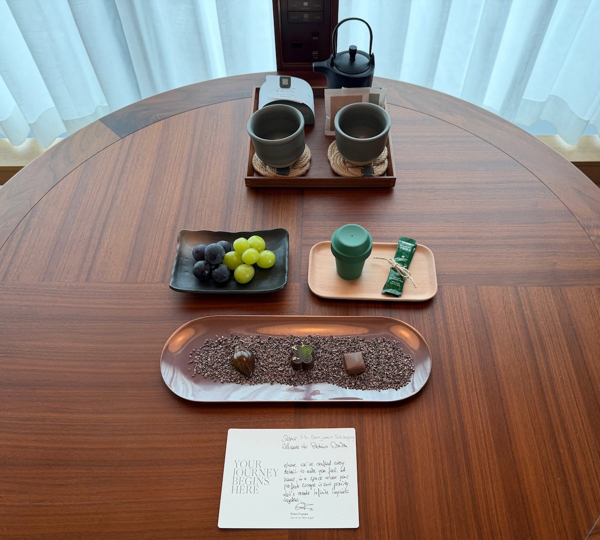 Welcome amenity of tea, grapes, matcha and sweets on the room table