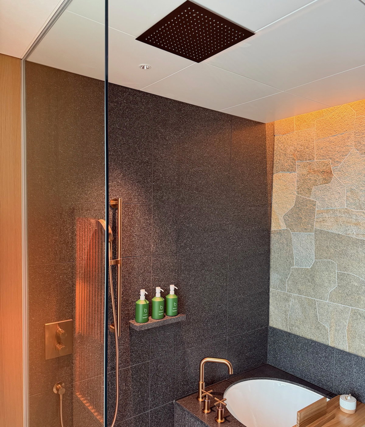 Shower and bathtub area in the Patina Osaka bathroom