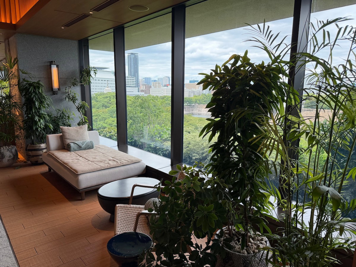Lounge seating beside the indoor pool at Patina Osaka